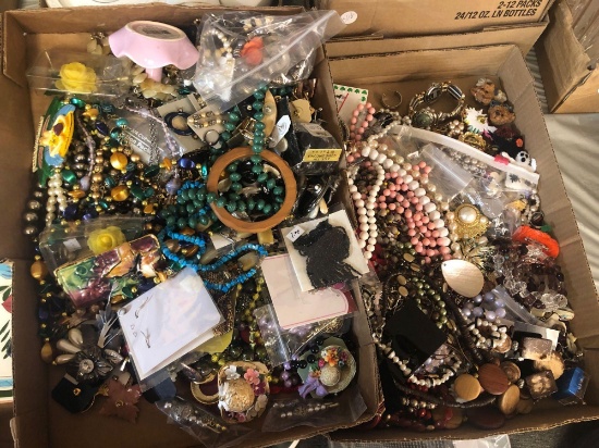 Two flats of costume jewelry