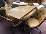 Table with 4 caster chairs