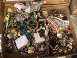 Two flats of costume jewelry