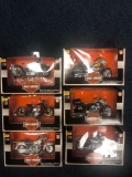 Six Harley Davidson diecast metal replica motorcycle models in boxes