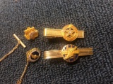 4 Goodyear service pins, 1 is marked 10K gold the others are marked GF