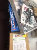 Stack of misc. auto parts, shift improver kit, fuel rail system, etc.