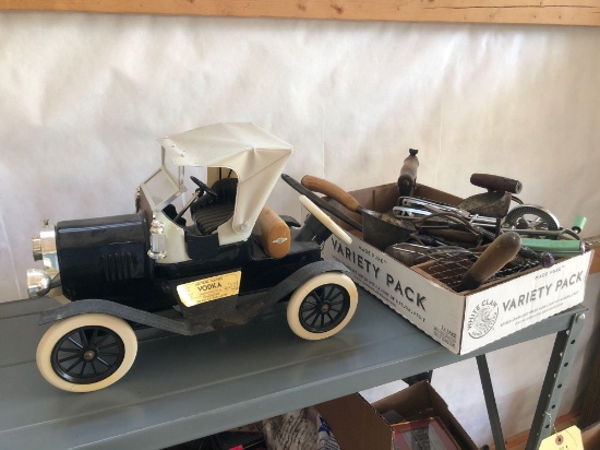 5 foot metal shelf & contents. Early kitchen utensils, Beam bottle car, ice skates, advertising tins