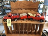 (3) toy trucks