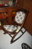 Rose carved rocking chair