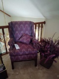 Upholstered High Back Arm Chair and Floral Decor