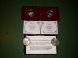 (2) Silver Commemorative Half Dollars, (2) Uncirculated Eisenhower Dollars
