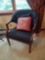 Upholstered armchair with nailhead trim