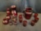 Pigeon blood pitcher, six tumblers, cruet, salt and pepper shakers, vases