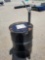 Oil barrel with pump with half full of 5w-20
