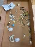 Box of religious pendants and jewelry