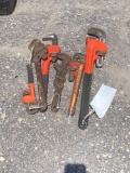 Six pipe wrenches, assorted sizes
