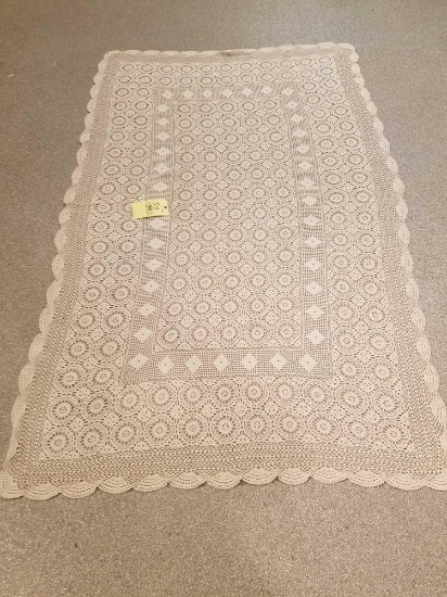 Knitted coverlett or tablecloth, 57 x 96in
