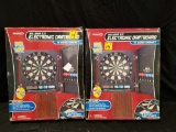 Pair of Halex millenia 5.0 electronic dartboard in wood cabinet