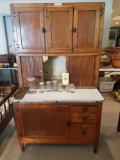 Hoosier brand kitchen cabinet with flour bins and spice jars