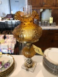 Floral Amber Fenton glass lamp