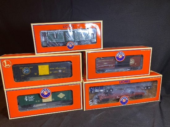 Lionel boxcars,caboose, & flatcar