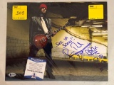Richard Fortus (Guns & Roses) autographed 14 x 11 photo. Beckett COA #H60385
