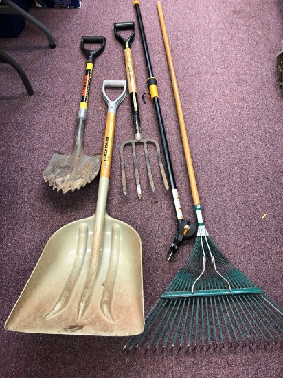 Large shovel, rake, pitchfork, and other yard tools