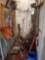 Bay of yard tools, pruners, forks, rakes