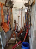 Bay of yard tools, pruners, forks, rakes