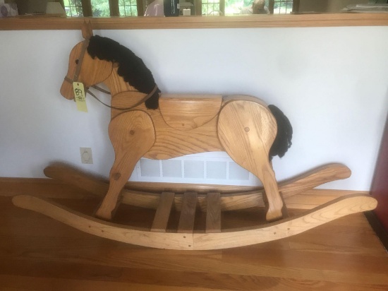 Full size rocking horse 4ft. Tall 6.5ft. Long