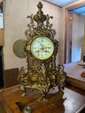 Brass porcelain face mantle clock, 19