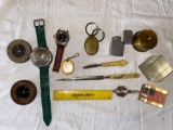 Admiral wrist compass, two other compasses, cigarette lighter, etc.