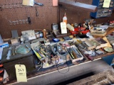 Loads of hardware & parts on work bench