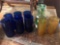 Cobalt blue six drinking glasses and green Polish water pitcher and two yellow depression glasses