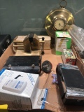 Clock, transistor radio, match box, etc.