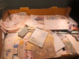 Large box of postage stamps and first day covers