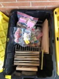 Heavy duty tote filled with Melissa and Doug puzzles and wire puzzle rack extra large