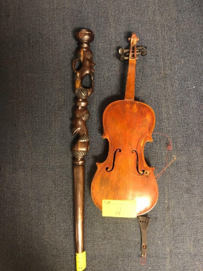 Violin and carved walking stick