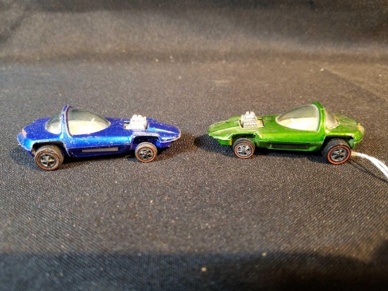 2 hotwheel redlines, one missing front driver wheel