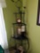 Pair of corner shelves with contents, vases, decor