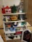 Contents of cabinet, art supplies, kitchen items