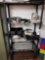Plastic shelf and contents, cameras
