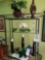 Contents of rack including lantern, vases, decor