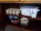 Contents of cupboard incl. crock pot, baking dishes, etc.