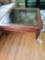 Coffee table with glass top