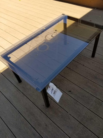 Glass-top patio table