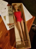 1960s Mattel Barbie doll, with box and stand