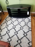 Oval TV stand, rug