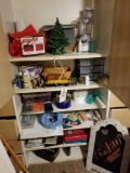 Contents of cabinet, art supplies, kitchen items