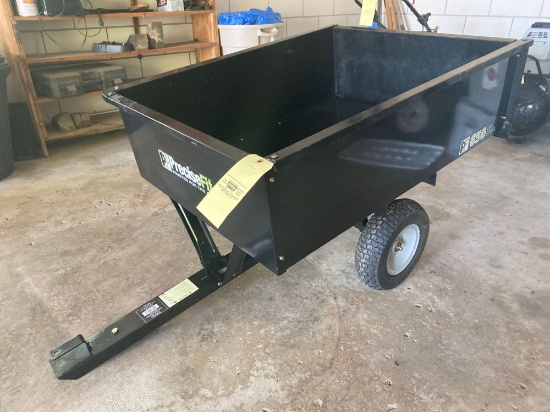 Precise Fit 650-lb. dump trailer.