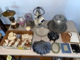 Figurines, candle lamp, small picture frames, Morton Salt coffee cups, decor items.