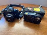 Vivitar V3800N 35mm camera, Minolta zoom 38-60mm camera.