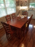 Modern dining table with 6 chairs, table with 2 drawers and metal bands on corners (contents not