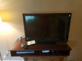 Vizio 38 inch flat screen tv with Phillips dvd player and mahogany table top pigeon hole